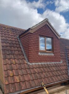 A new dormer roof and window installed on a house by Southampton Roofers.
