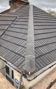 A new tiled roof and ridge line installed on a property by Southampton Roofers.