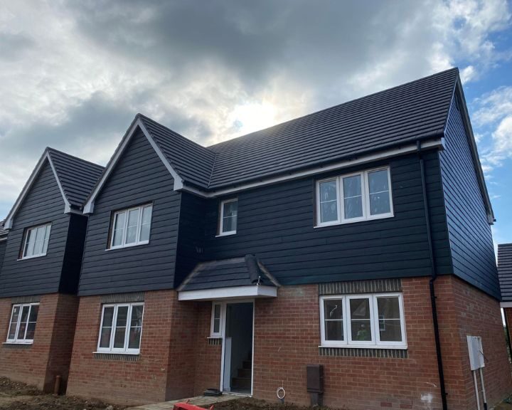 New composite cladding installed to the exterior of a new build house in Southampton.