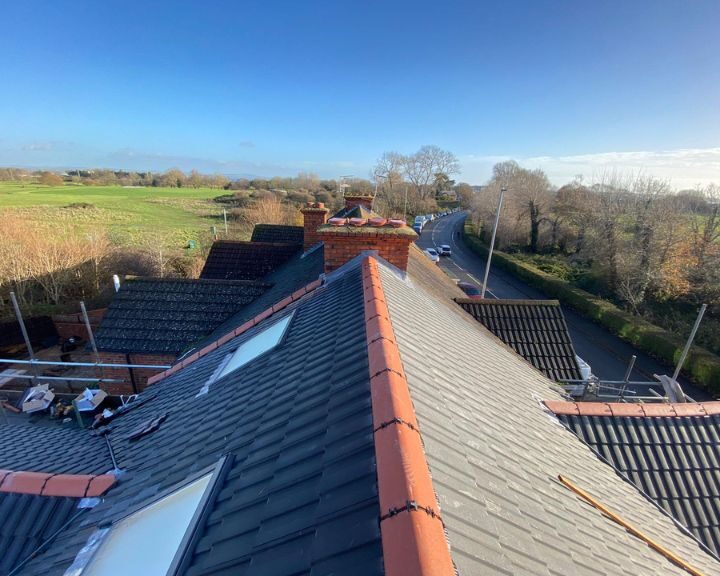 A new roof being inspected by a roofer in Southampton.
