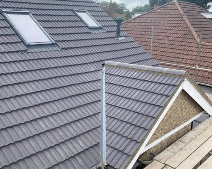 A new pitched roof with grey tiles installed on a house by Southampton Roofers.